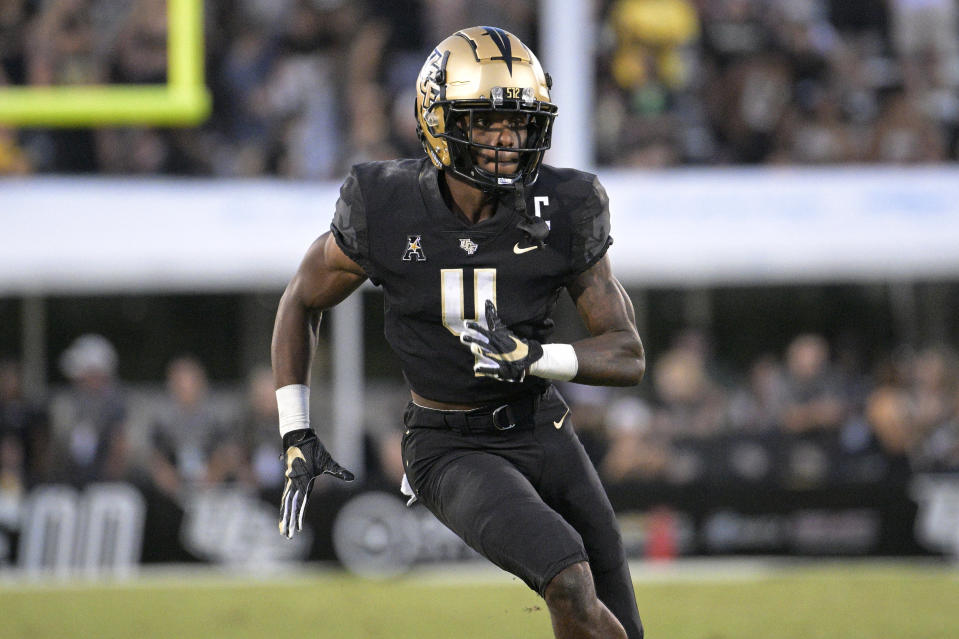 FILE - Central Florida wide receiver Ryan O'Keefe runs a route during the team's NCAA college football game against Georgia Tech, Sept. 24, 2022, in Orlando, Fla. O'Keefe transferred to Boston College. Boston College opens their season at home against Northern Illinois on Sept. 2.(AP Photo/Phelan M. Ebenhack, File)