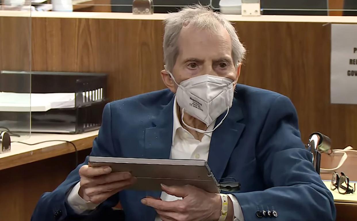 Real estate heir Robert Durst watches as Deputy District Attorney John Lewin, presents a new round of opening statements in the murder case against Durst after a 14-month recess due to the coronavirus pandemic in Los Angeles County Superior Court in Inglewood, Calif., on Tuesday, May 18, 2021.