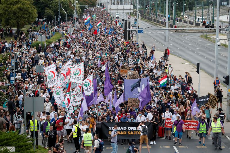 FILE PHOTO: People take part in a protest for media freedom in Budapest