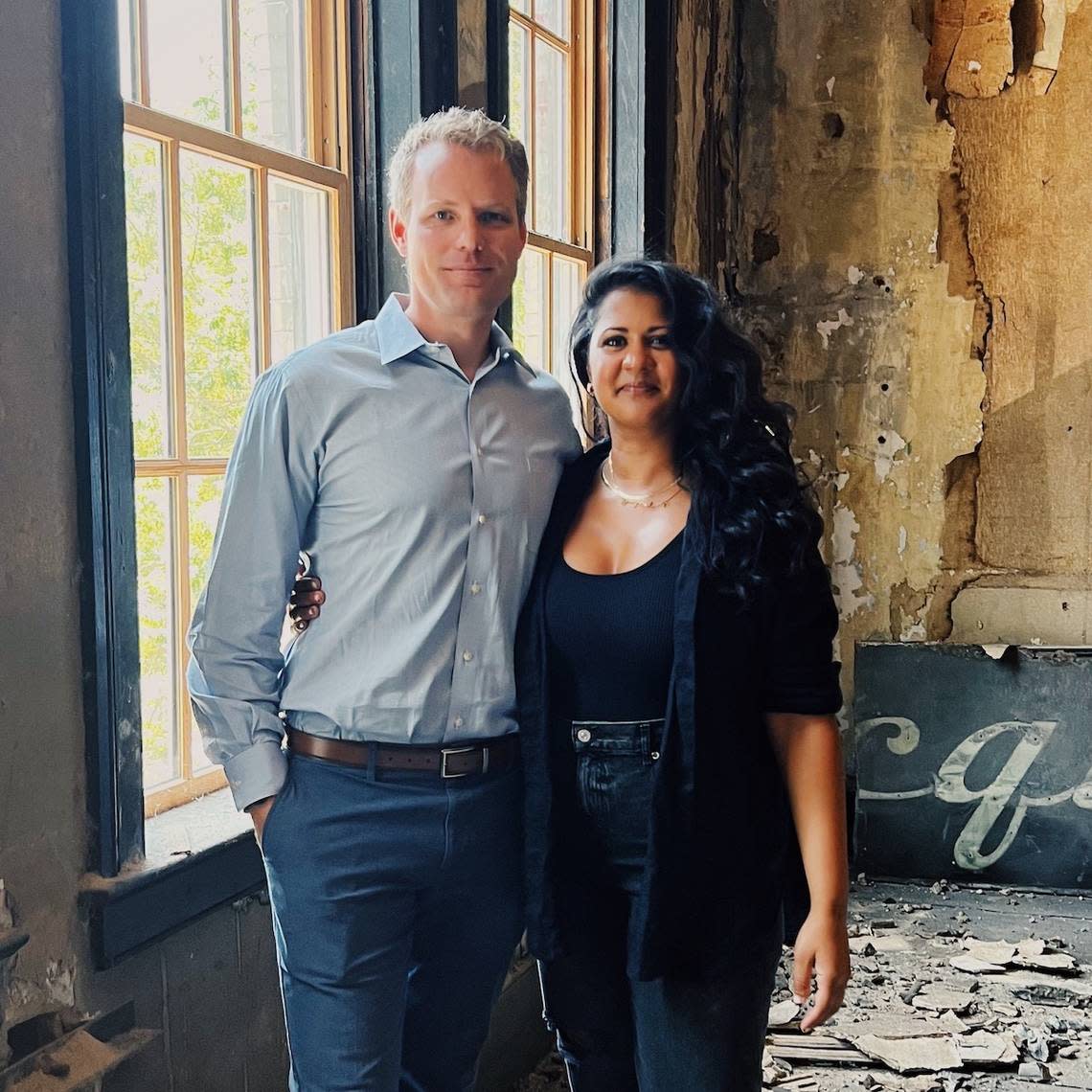 Hotel Trundle owners Marcus Munse and Rita Patel stand in the future bridal suite of the hotel’s upcoming new Flutter Wing on Main Street in downtown Columbia.