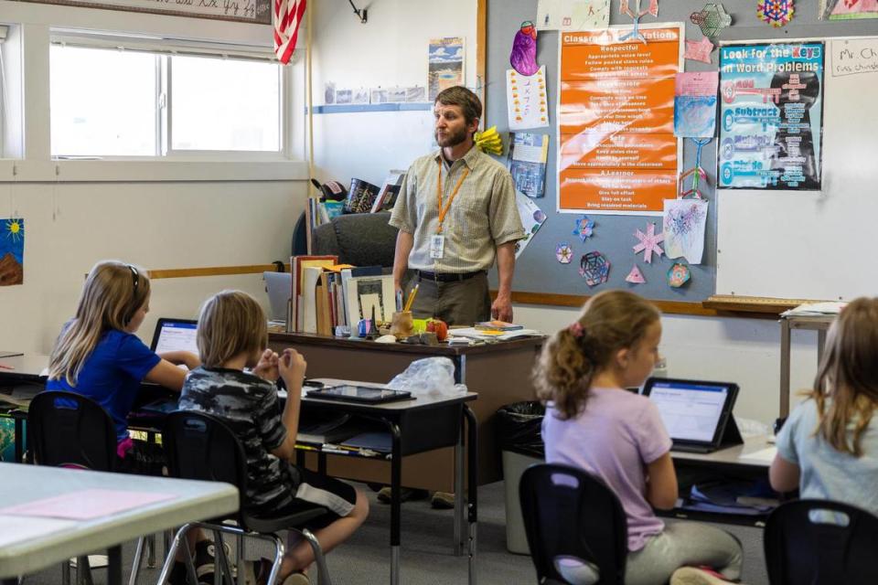 Teacher Russ Chinske’s third grade students complete an assignment on their Chromebooks. Chinske has taught for the Salmon School District for 20 years.