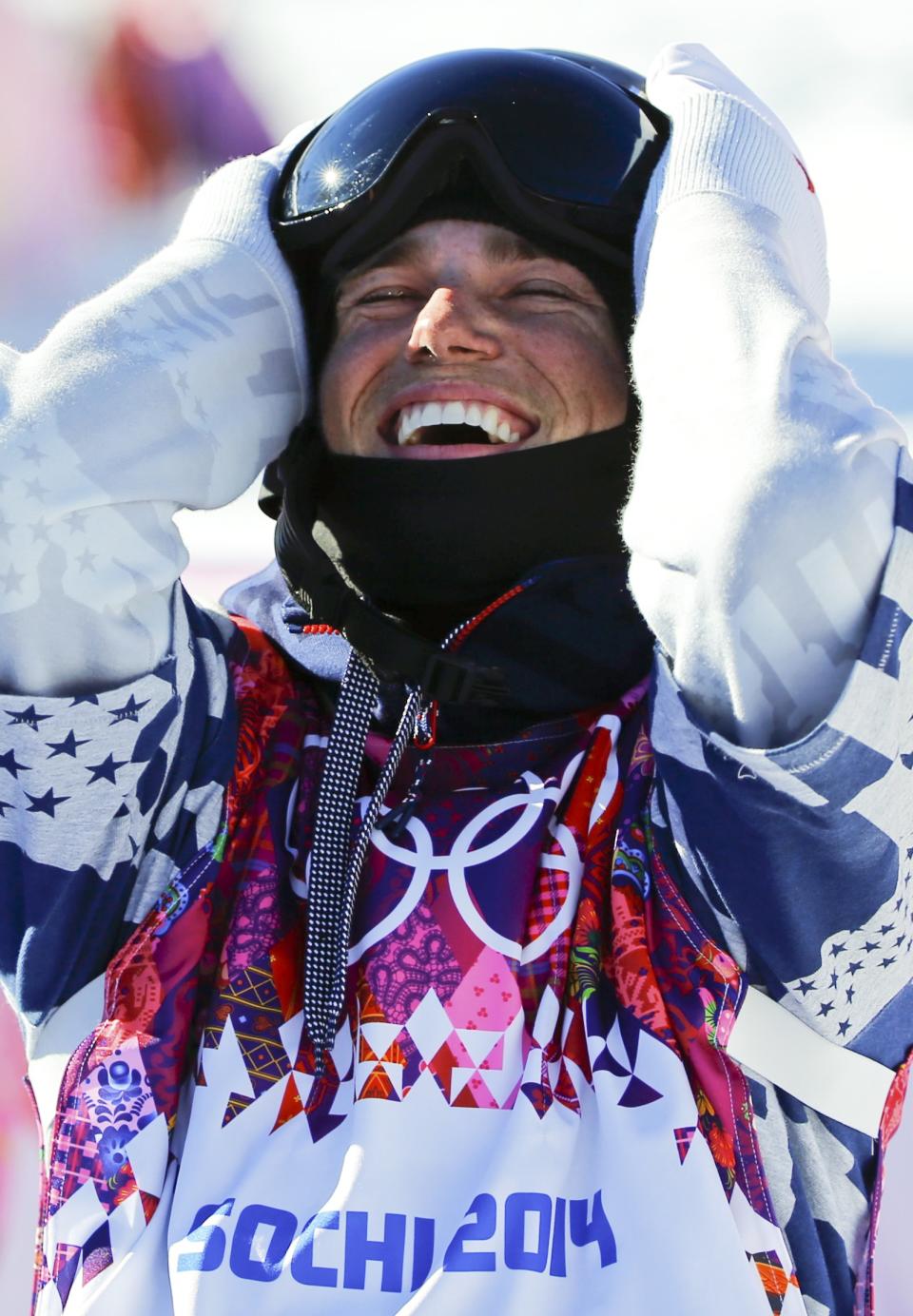 Gus Kenworthy of the U.S. reacts on the finish line during the men's freestyle skiing slopestyle finals at the 2014 Sochi Winter Olympic Games in Rosa Khutor, February 13, 2014. REUTERS/Mike Blake