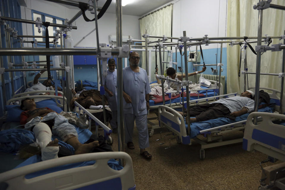 Wounded men receive treatment in a hospital after a large explosion in Kabul, Afghanistan, Monday, Sept. 2, 2019. The Taliban claimed responsibility for a large explosion in the Afghan capital Monday night, which government officials said targeted an area home to several international organizations and guesthouses. (AP Photo/Rahmat Gul)
