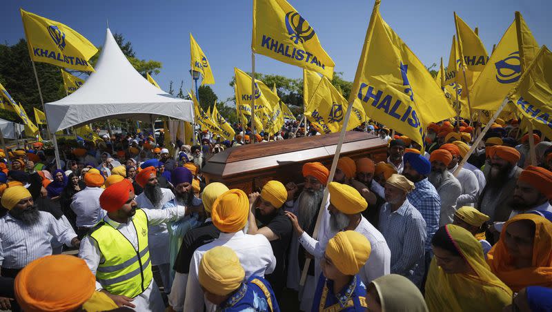 Mourners carry the casket of Sikh community leader and temple president Hardeep Singh Nijjar during Antim Darshan, the first part of a daylong funeral service for him, in Surrey, British Columbia, on June 25, 2023. Canada expelled a top Indian diplomat on Monday, Sept. 18, as it investigates what Prime Minister Justin Trudeau called credible allegations that India’s government may have had links to the Sikh activist’s assassination.