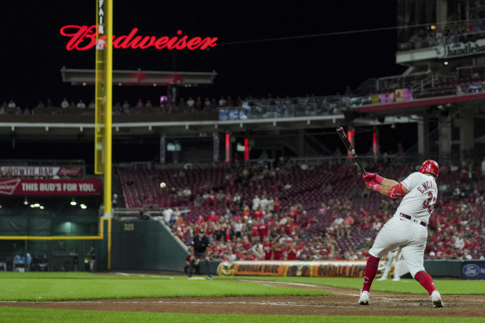 Cincinnati Reds' Christian Encarnacion-Strand hits a winning RBI single during the ninth inning of a baseball game against the Seattle Mariners in Cincinnati, Tuesday, Sept. 5, 2023. (AP Photo/Aaron Doster)