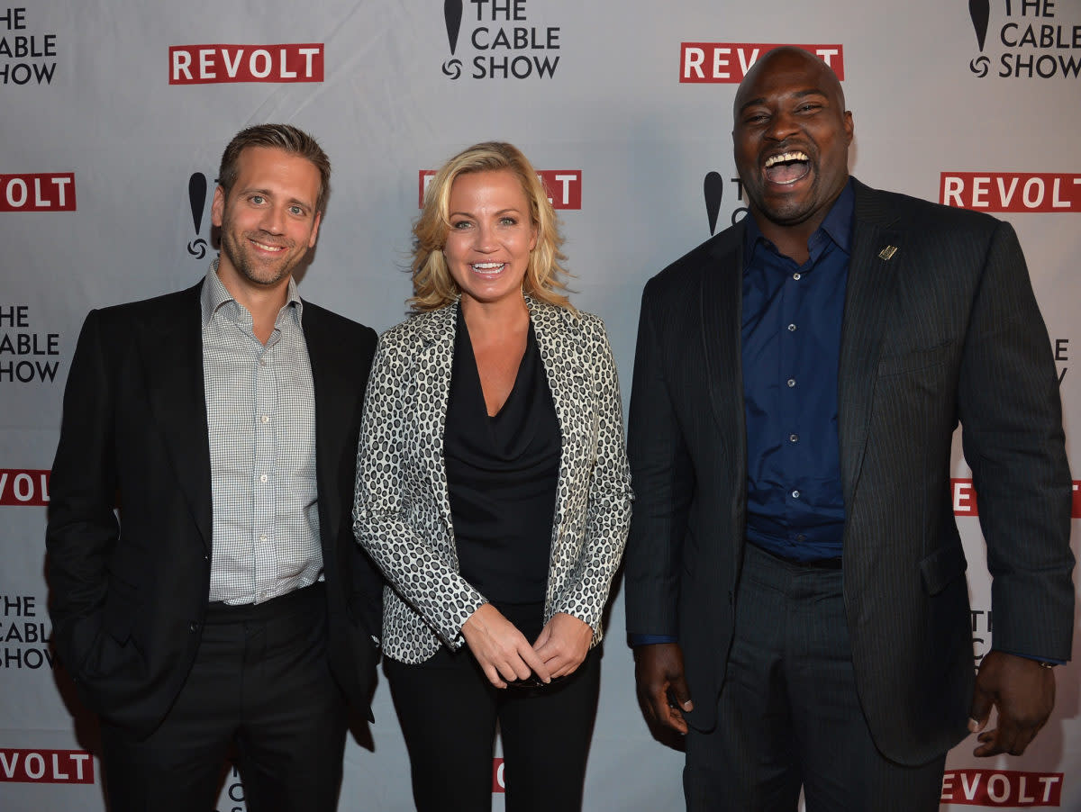 ESPN's Max Kellerman, Michelle Beadle, and Marcellus Wiley at an event.