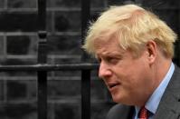 Britain's Prime Minister Boris Johnson leaves Downing Street, in London