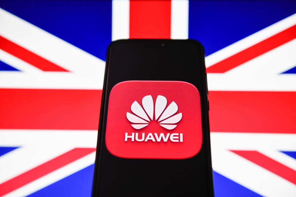 In this photo illustration a Huawei logo seen displayed on a smart phone with United Kingdom flag on the background. Photo Illustration by Omar Marques/SOPA Images/LightRocket via Getty Images