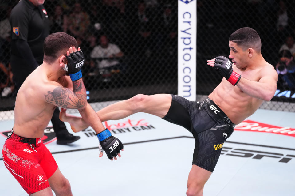 LAS VEGAS, NEVADA – MARCH 16: (R-L) Charalampos Grigoriou of Cyprus kicks Chad Anheliger of Canada in their bantamweight fight during the UFC Fight Night event at UFC APEX on March 16, 2024 in Las Vegas, Nevada. (Photo by Jeff Bottari/Zuffa LLC via Getty Images)