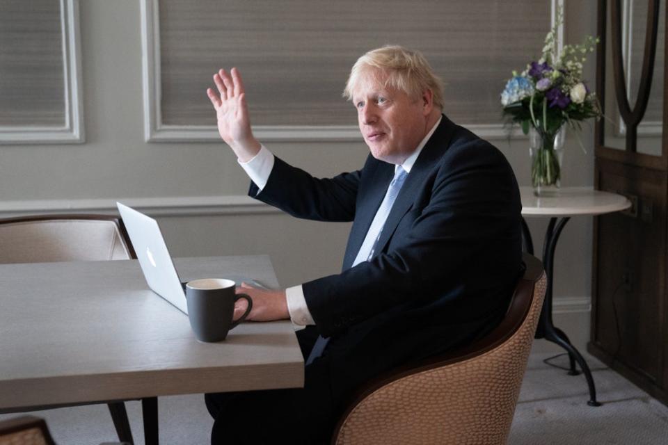 Prime Minister Boris Johnson prepares his keynote speech in his hotel room in Manchester before addressing the Conservative Party conference on Wednesday (Stefan Rousseau/PA) (PA Wire)
