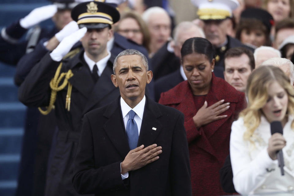 <p>Former president Barack Obama and former First Lady Michelle Obama listen during the national anthem during inauguration ceremonies swearing in Donald Trump as the 45th president of the United States on the West front of the U.S. Capitol in Washington on Jan. 20, 2017. (Photo: Carlos Barria/Reuters) </p>