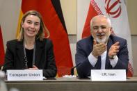 EU foreign policy chief Federica Mogherini (L) and Iranian Foreign Minister Mohammad Javad Zarif pictured before the opening of a plenary session on Iran nuclear talks at the Beau Rivage Palace Hotel in Lausanne, Switzerland, on March 30, 2015