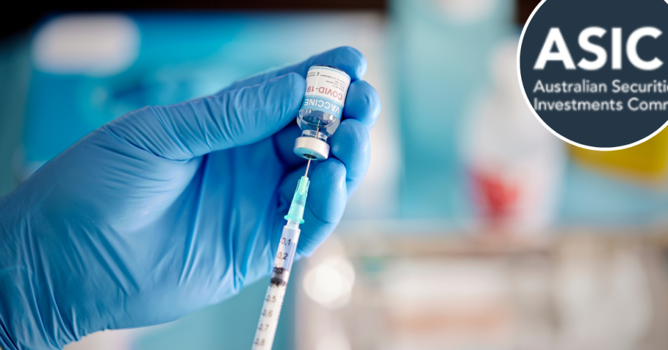 A gloved hand prepared a syringe with a dose of COVID vaccine with a small ASIC logo in the top right corner.