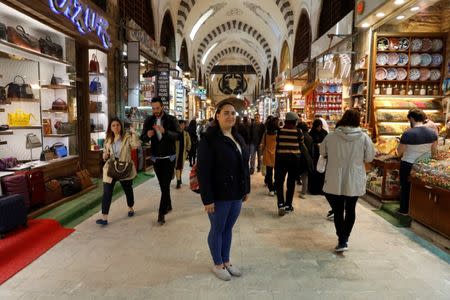 Galatasaray University student Pelin Isilak, 19, who says she will vote 'No', poses in an old bazaar in Istanbul, Turkey, April 10, 2017. REUTERS/Umit Bektas