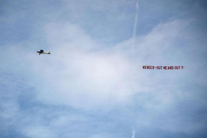 A plane flew over Stoke's Bet365 Stadium in during a 2017 match calling for Wenger's exit (PA)