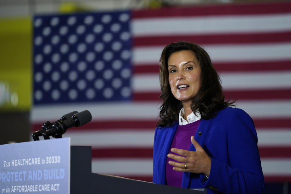 FILE - In this Friday, Oct. 16, 2020 file photo, Michigan Gov. Gretchen Whitmer speaks during an event with Democratic presidential candidate former Vice President Joe Biden at Beech Woods Recreation Center in Southfield, Michigan Gov. Gretchen Whitmer on Thursday, Nov. 19, 2020 repeated her plea to Michigan residents to limit gatherings at Thanksgiving and keep loved ones safe. Whitmer's appeal came as the state health department reported 7,592 new confirmed cases of the coronavirus and 134 deaths, including 61 that were added after a records review.. (AP Photo/Carolyn Kaster, File)