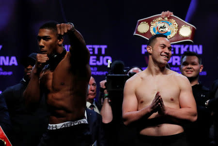 Boxing - Anthony Joshua & Joseph Parker Weigh-In - Motorpoint Arena, Cardiff, Britain - March 30, 2018 Anthony Joshua and Joseph Parker during the weigh in Action Images via Reuters/Andrew Couldridge