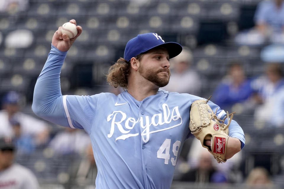 Kansas City Royals starting pitcher Jonathan Heasley throws during the first inning of a baseball game against the Minnesota Twins Thursday, Sept. 22, 2022, in Kansas City, Mo. (AP Photo/Charlie Riedel)