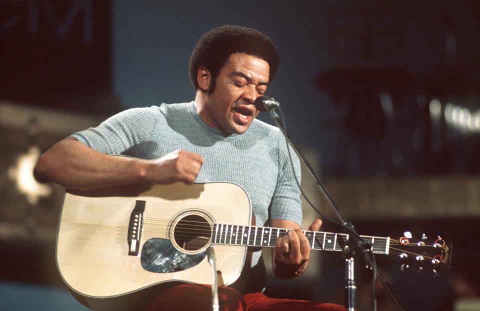 The American singer, guitarist and songwriter Bill Withers on stage at Music Festival in Cannes in 1973. The artist was born in Slab Fork, West Virginia, on 4th July 1938. | usage worldwide (Photo by Goebel/picture alliance via Getty Images)