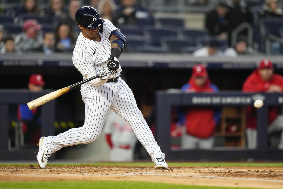 New York Yankees' Gleyber Torres hits an RBI-single during the first inning of a baseball game against the Philadelphia Phillies, Monday, April 3, 2023, in New York. (AP Photo/Frank Franklin II)