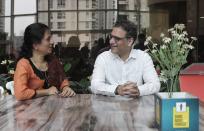 Dr. Kedar Toraskar, head of critical care, right, catches up with his wife Dr. Nameeta Toraskar, who works in a different hospital at the cafeteria of Mumbai Central Wockhardt Hospital in Mumbai, India, June 5, 2021. The recent coronavirus surge in India affected young people on a scale his team of critical care doctors hadn’t previously seen. Toraskar and his team of ICU doctors are still drained from the incredibly challenging last few months. (AP Photo/Rajanish Kakade)