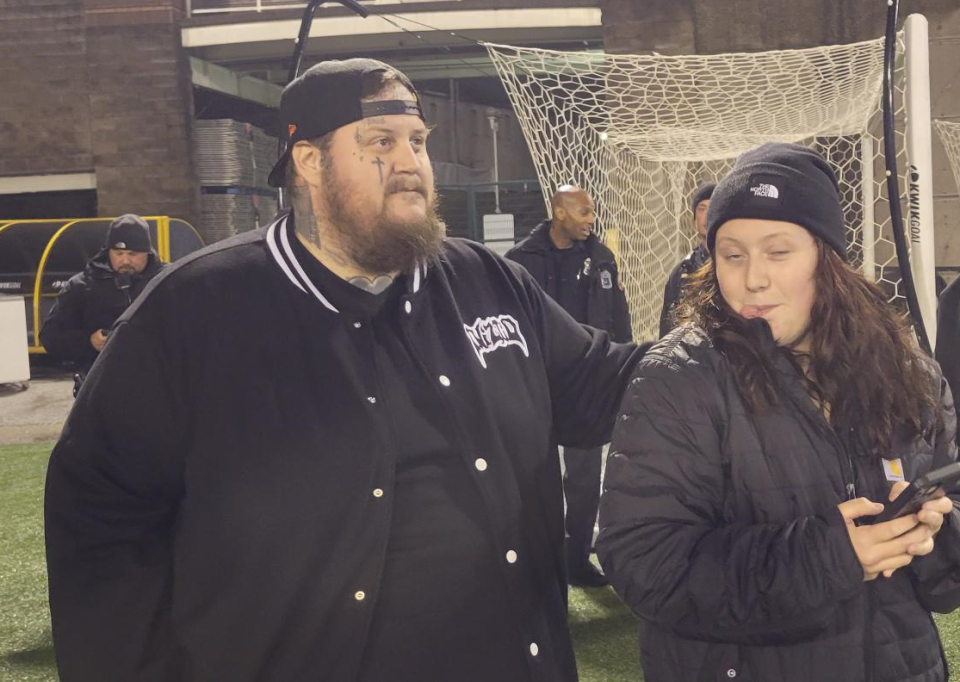 Country music star Jelly Roll watches the Class 5A state championship game Friday between Knoxville West and Page.