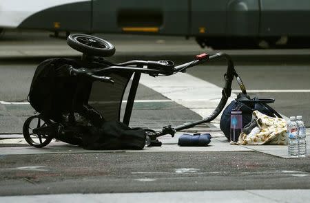 A pram is seen as police cordon off Bourke Street mall, after a car hit pedestrians in central Melbourne, Australia, January 20, 2017. REUTERS/Edgar Su