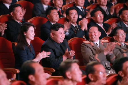North Korean leader Kim Jong Un claps during a celebration for nuclear scientists and engineers who contributed to a hydrogen bomb test, in this undated photo released by North Korea's Korean Central News Agency (KCNA) in Pyongyang on September 10, 2017. KCNA via REUTERS
