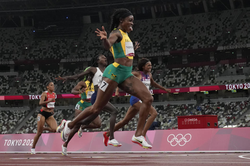 Elaine Thompson-Herah, of Jamaica, wins the final of the women's 200-meters at the 2020 Summer Olympics, Tuesday, Aug. 3, 2021, in Tokyo. (AP Photo/David J. Phillip)