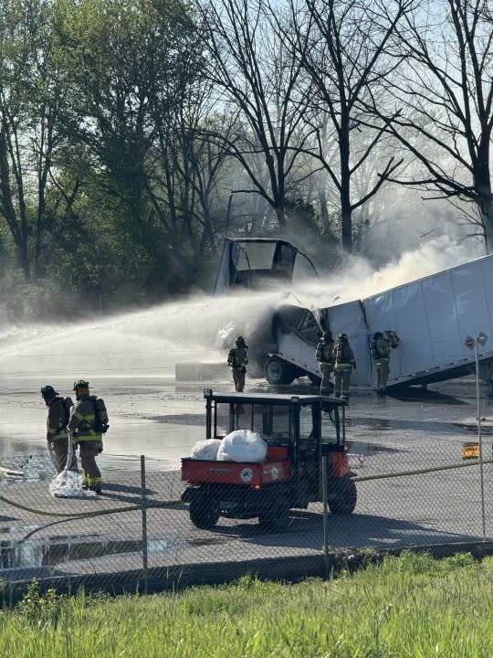 Firefighters extinguish a blaze inside a semi-truck trailer that contained nearly three tons of lithium-ion batteries, which created a hazmat situation, April 18, 2024. (Courtesy/Columbus Division of Fire)