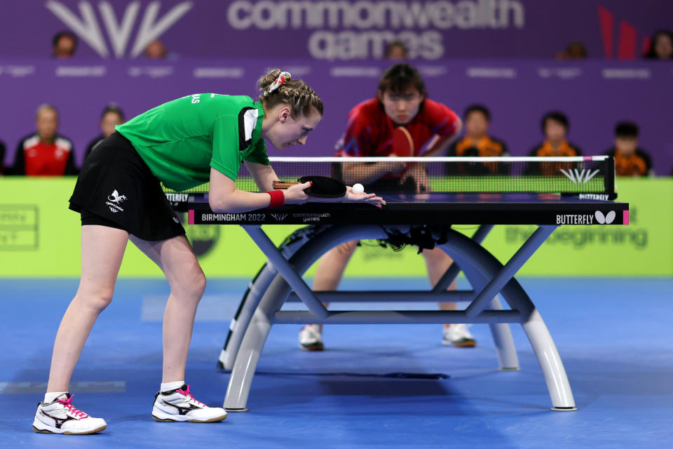 BIRMINGHAM, ENGLAND - JULY 31: Chloe Anna Thomas Wu Zhang of Team Wales serves against Li Sian Alice Chang of Team Malaysia during the Women's Table Tennis Team Semi-Final match between Team Wales and Team Malaysia on day three of the Birmingham 2022 Commonwealth Games at NEC Arena on July 31, 2022 on the Birmingham, England. (Photo by Clive Brunskill/Getty Images)