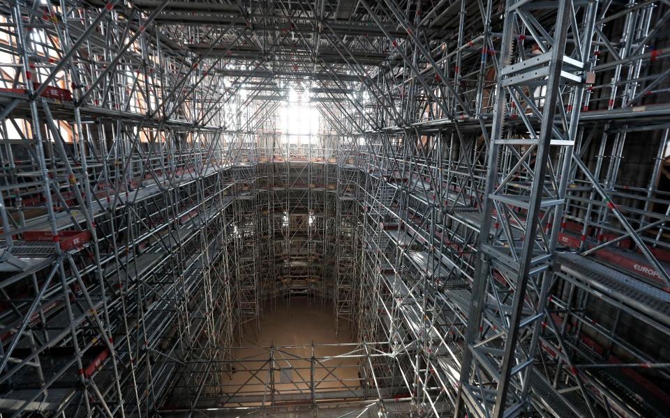 A view of the main scaffolding under the vaults of Notre Dame - AP