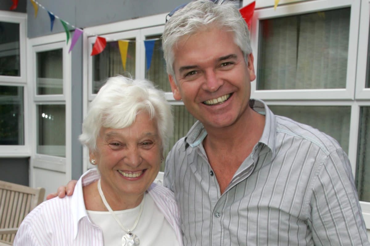 Phillip with doting mum Pat who told him 'I don't care' when he came out as gay (Phillip Schofield/Instagram)