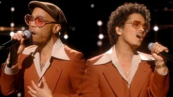 Singing sensations Anderson .Paak (left) and Bruno Mars (right), together comprising the duo Silk Sonic, perform during the Grammy Awards broadcast in March. (Photo by Theo Wargo/Getty Images for The Recording Academy)