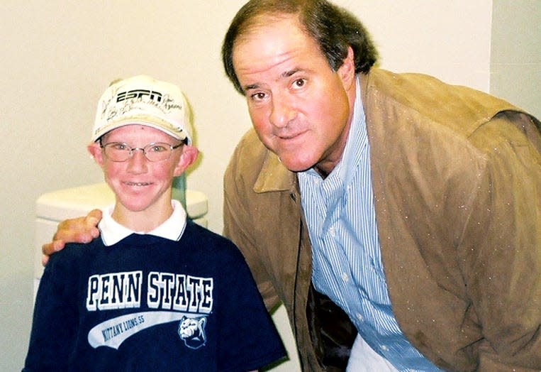 Cody Lehmann poses with ESPN's Chris Berman during a visit to the company's Bristol, CT headquarters in 2005. When Cody was 3, he had to have a full zipper operation for open heart surgery. He had 28 surgeries and medical procedures in his childhood.