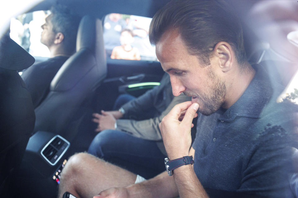 Harry Kane arrives for medical tests at a hospital in Munich, Friday Aug. 11, 2023. England captain Harry Kane's transfer from Tottenham to Bayern Munich is “imminent,” Spurs manager Ange Postecoglou said Friday, in a deal that will reportedly be worth more than 100 million pounds ($110 million). (Matthias Balk/dpa via AP)
