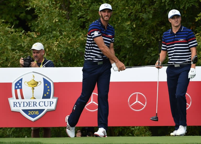 Team USA's Dustin Johnson (L) and Jordan Spieth during a Ryder Cup practice round