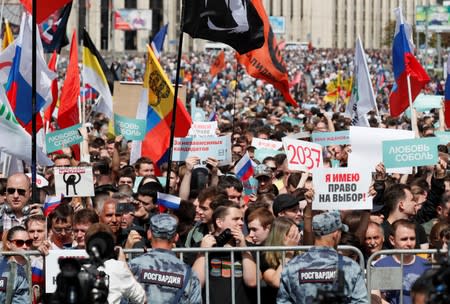 People take part in a rally in support of independent candidates for elections to the capital's regional parliament in Moscow