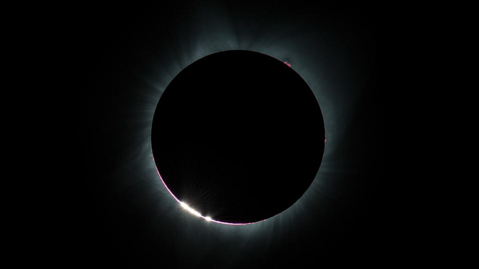 The Bailey's Beads effect is seen as the moon makes its final move over the sun during the total solar eclipse on Monday, August 21, 2017 above Madras, Oregon.