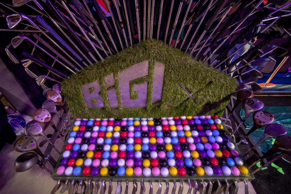 A throne made of golf clubs and balls at Best In Games in Ypsilanti on May 16, 2022. Best In Games is a new 74,000 square foot facility with an arcade, two restaurants, axe throwing, laser tag, football bowling, go karts, glow golf, and trampolines.