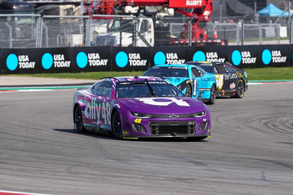 Alex Bowman (48) leads a group of cars during the NASCAR Cup Series race at Circuit of the Americas on March 26, 2023.