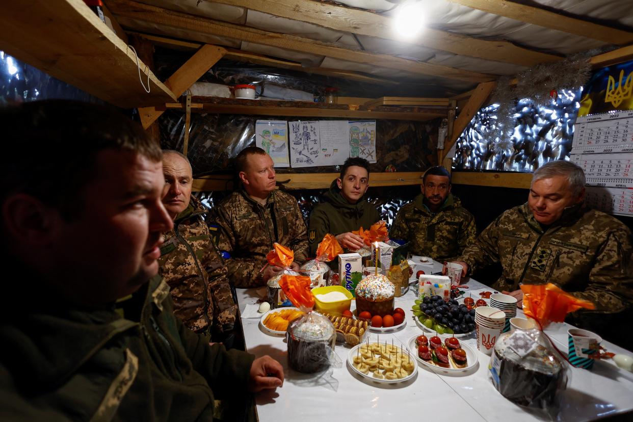 Serhii Naiev, Commander of the Joint Forces of the Armed Forces of Ukraine, celebrates the Orthodox Easter with service members at a position in direction of the border with Belarus (REUTERS)