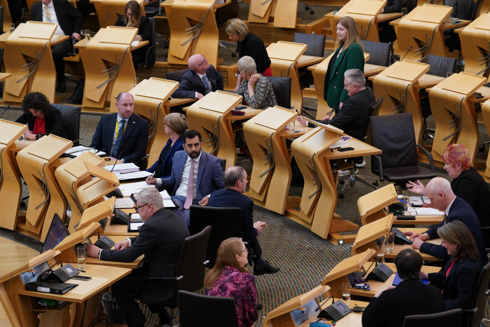 Humza Yousaf was in the Holyrood chamber to face questions from opposition MSPs for the first time as First Minister (Andrew Milligan/PA)