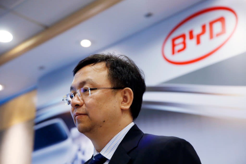 Wang Chuanfu, chairman of BYD Co., attends a news conference in Hong Kong, on Monday, Aug. 25, 2014. BYD, a Chinese electric-car maker partially owned by Warren Buffetts Berkshire Hathaway Inc., dropped after forecasting a decline in profit. Photographer: Brent Lewin/Bloomberg via Getty Images