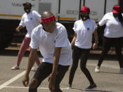 Artist Master KG, dances to Jerusalema in Johannesburg, Thursday, Sept. 24, 2020. South Africans of all walks of life are dancing to the rousing anthem, which has sparked a global trend, to lift their spirits amid the battle against COVID-19. (AP Photo/Denis Farrell)