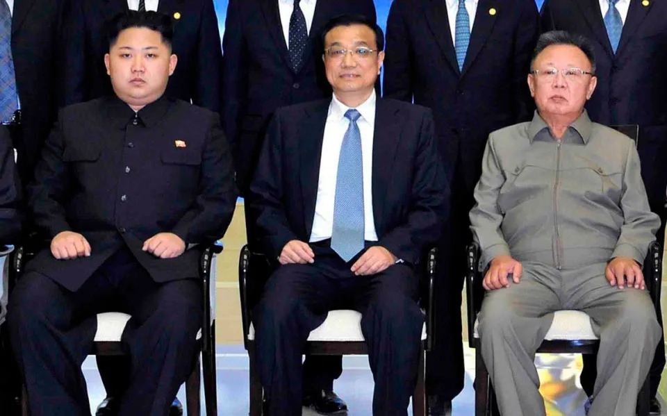 With Kim Jong-un, left, and Kim Jong-il, in Pyongyang in 2011
