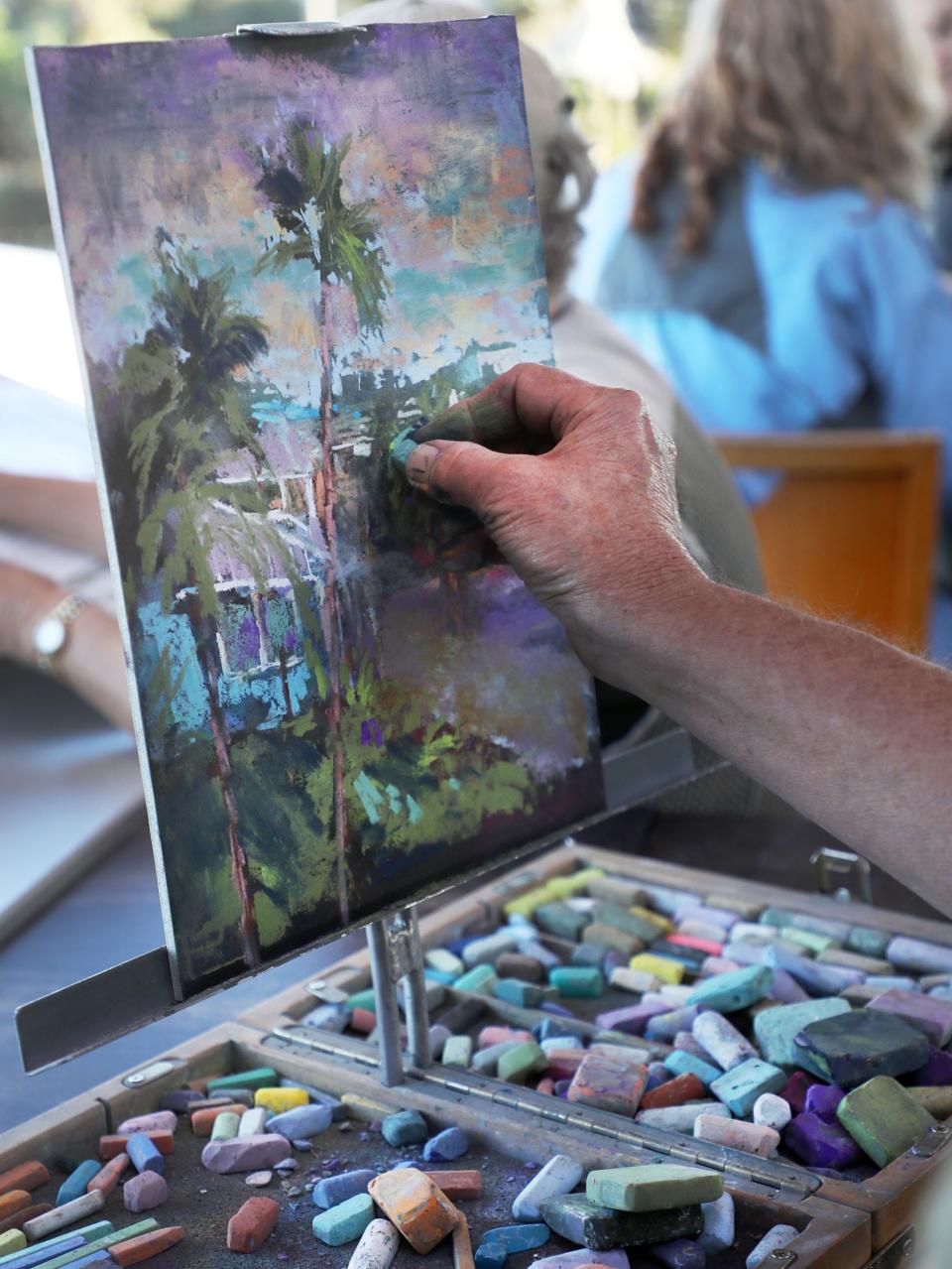 Artist Preston King works a scene, Tuesday, Oct. 17, 2023, during the New Smyrna Beach Plein Air Paint Out at the Avanu on Flagler restaurant.