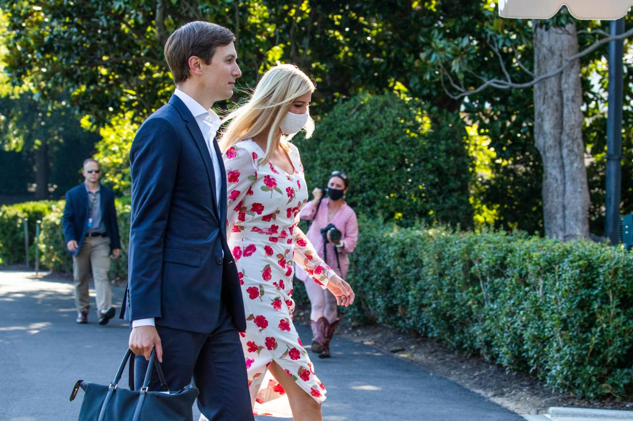 <p>Ivanka Trump, right, daughter of and adviser to President Donald Trump, and White House senior adviser Jared Kushner walk on the South Lawn after they arrived with the president at the White House, Sunday, July 26, 2020.</p> (AP)
