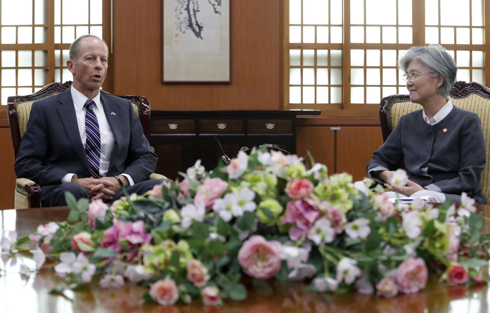 South Korean Foreign Minister Kang Kyung-wha, right, talks with David Stilwell, U.S. Assistant Secretary of State for the Bureau of East Asian and Pacific Affairs, during a meeting at the foreign ministry in Seoul, South Korea, Wednesday, July 17, 2019. (AP Photo/Ahn Young-joon. Pool)