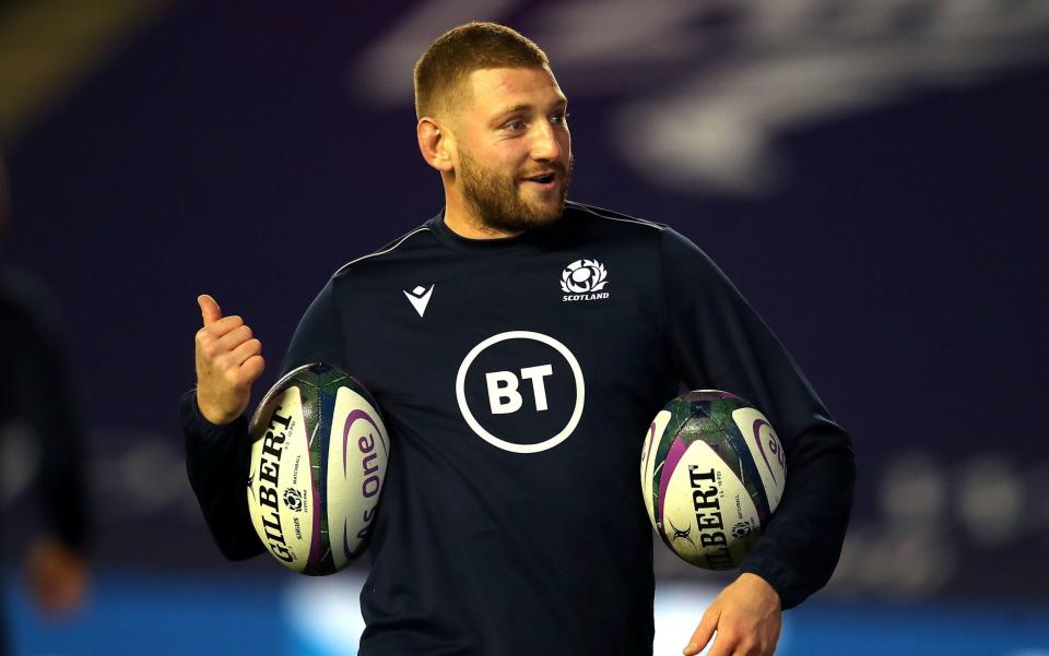 Now off the naughty step Finn Russell is back in the Scotland side - PA